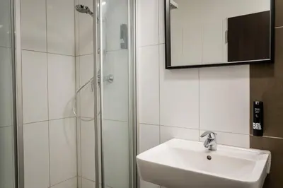 Ein Badezimmer in der Unterkunft Apartmenthaus Berlin Neukölln