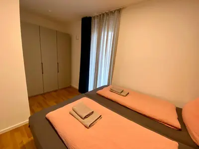 Ein Bett oder Betten in einem Zimmer der Unterkunft Apartments am Lutherplatz