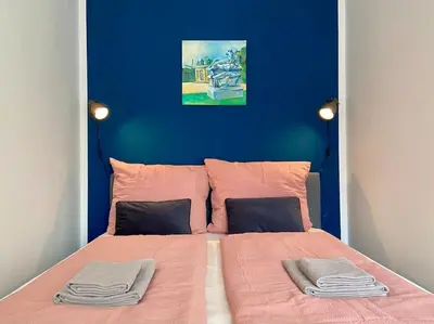 Ein Bett oder Betten in einem Zimmer der Unterkunft Apartments am Lutherplatz