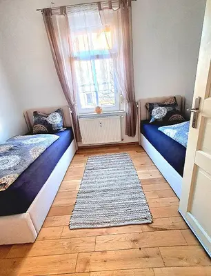 Ein Bett oder Betten in einem Zimmer der Unterkunft Wohlfühloase in der City