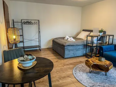 Ein Bett oder Betten in einem Zimmer der Unterkunft Apartment für 2 mit Balkon