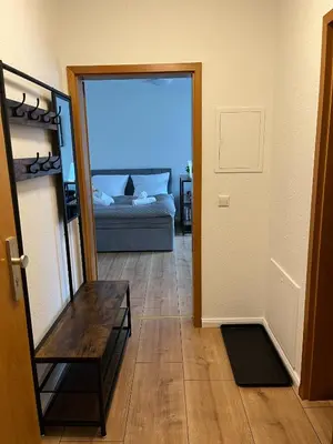 Ein Bett oder Betten in einem Zimmer der Unterkunft Apartment für 2 mit Balkon