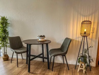 Ein Sitzbereich in der Unterkunft Apartment für 2 mit Balkon