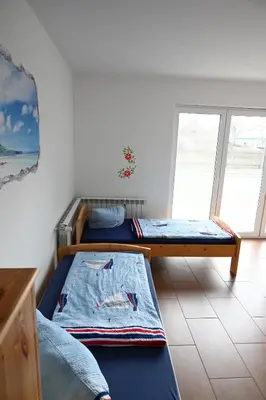 Ein Bett oder Betten in einem Zimmer der Unterkunft Monteure sind HERZLICH WILLKOMMEN!