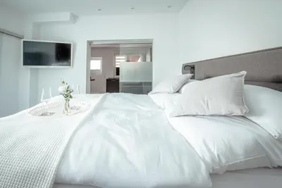Ein Bett oder Betten in einem Zimmer der Unterkunft Landpartie