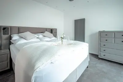 Ein Bett oder Betten in einem Zimmer der Unterkunft Landpartie