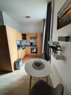 Küche/Küchenzeile in der Unterkunft Einraumapartment im Erdgeschoss mit Seeblick