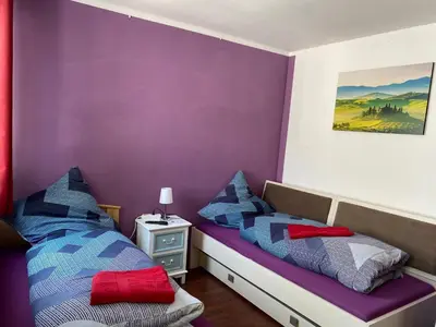 Ein Bett oder Betten in einem Zimmer der Unterkunft Pension am Bahnhof
