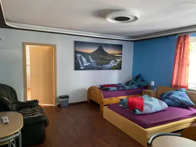 Ein Bett oder Betten in einem Zimmer der Unterkunft Pension am Bahnhof