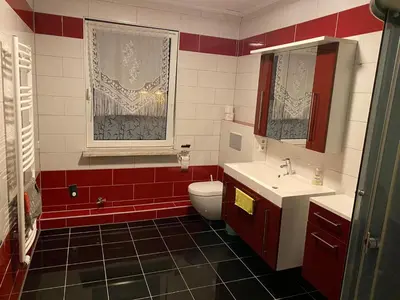 Ein Badezimmer in der Unterkunft Pension am Bahnhof