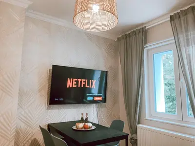 TV/Unterhaltungsangebot in der Unterkunft BetterBeds Berlin