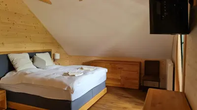 Ein Bett oder Betten in einem Zimmer der Unterkunft Blockhaus an der Dahme , Ferienhaus