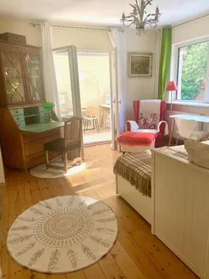 Ein Sitzbereich in der Unterkunft Studio im Haus Amselgarten