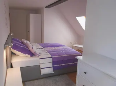 Ein Bett oder Betten in einem Zimmer der Unterkunft Business Apartments Netzeband