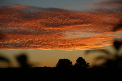 Blick auf den Sonnenuntergang/Sonnenaufgang von der Ferienwohnung aus oder aus der Nähe