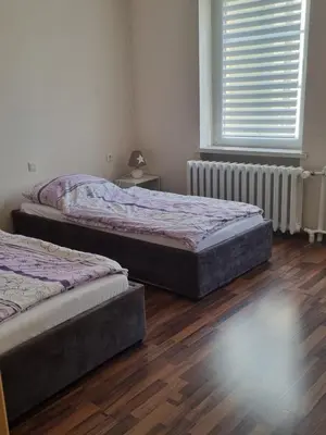 Ein Bett oder Betten in einem Zimmer der Unterkunft Ferienwohnung am Kanuverleih