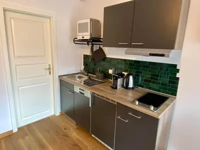 Küche/Küchenzeile in der Unterkunft Apartments am Markt