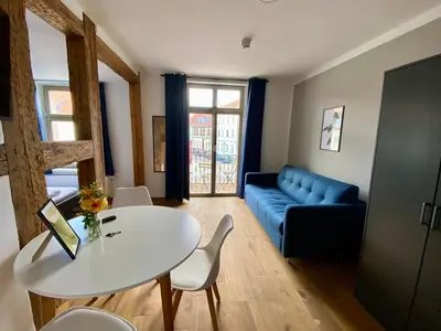 Ein Sitzbereich in der Unterkunft Apartments am Markt
