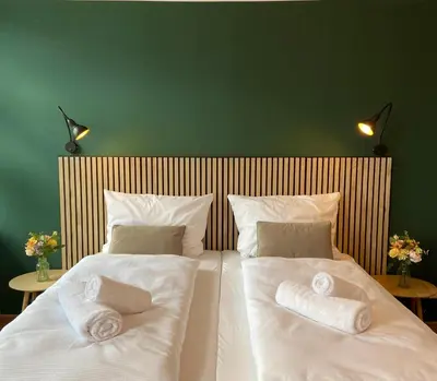Ein Bett oder Betten in einem Zimmer der Unterkunft Apartments am Markt