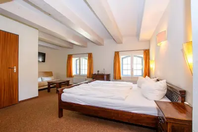 Ein Bett oder Betten in einem Zimmer der Unterkunft Hotel Stadtgut