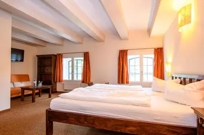 Ein Bett oder Betten in einem Zimmer der Unterkunft Hotel Stadtgut