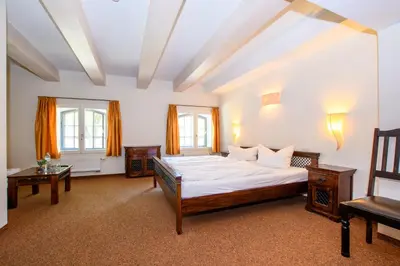Ein Bett oder Betten in einem Zimmer der Unterkunft Hotel Stadtgut
