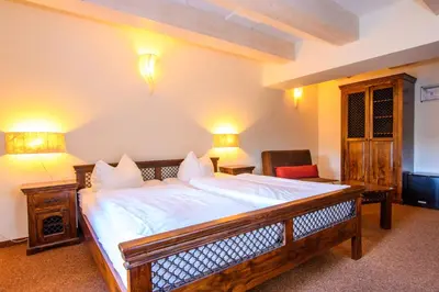 Ein Bett oder Betten in einem Zimmer der Unterkunft Hotel Stadtgut