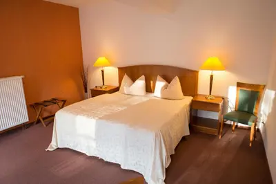 Ein Bett oder Betten in einem Zimmer der Unterkunft Internat Schloss Spiegelberg