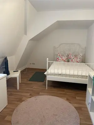 Ein Bett oder Betten in einem Zimmer der Unterkunft Internat Schloss Spiegelberg
