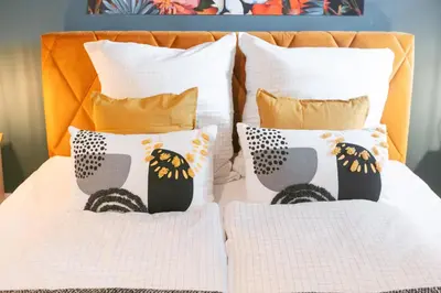 Ein Bett oder Betten in einem Zimmer der Unterkunft Blue Chili 34 - City Apartment für 4 in Karlshorst