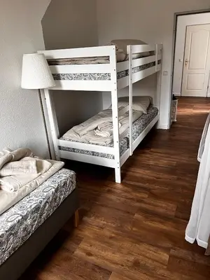 Ein Bett oder Betten in einem Zimmer der Unterkunft Apartments Bouchon