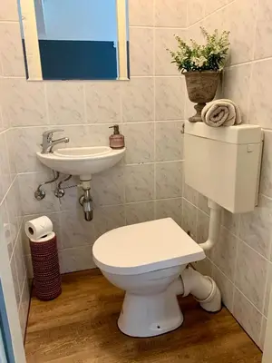 Ein Badezimmer in der Unterkunft Apartments Bouchon