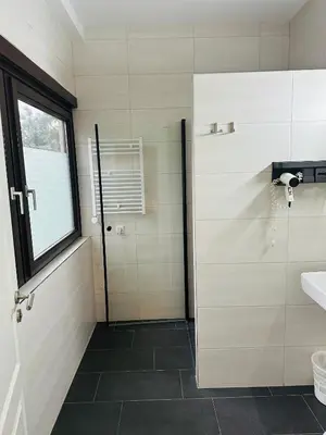 Ein Badezimmer in der Unterkunft Hotel Pirol
