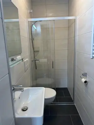 Ein Badezimmer in der Unterkunft Hotel Pirol