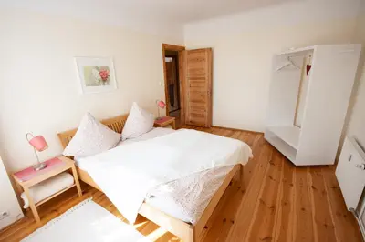 Ein Bett oder Betten in einem Zimmer der Unterkunft Ferienwohnung Fläming