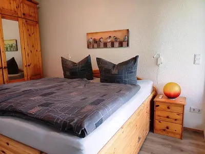 Ein Bett oder Betten in einem Zimmer der Unterkunft Moderne Ferienwohnung in Berlin Mahlsdorf