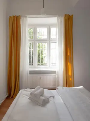 Ein Bett oder Betten in einem Zimmer der Unterkunft Hip & Beautiful City Apartment