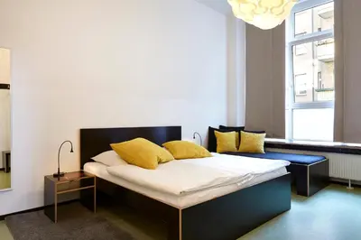 Ein Bett oder Betten in einem Zimmer der Unterkunft Hüttenpalast