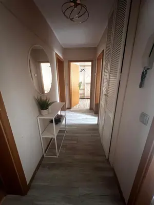 Ein Bett oder Betten in einem Zimmer der Unterkunft 3-Zimmer Ferienunterkunft inkl Parkplatz und Balkon, mit Nähe zum See