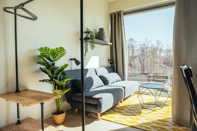 Ein Sitzbereich in der Unterkunft The Rix Studios & Suites