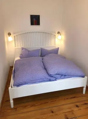 Ein Bett oder Betten in einem Zimmer der Unterkunft Traumhafte Ferienwohnung im Herzen von Templin