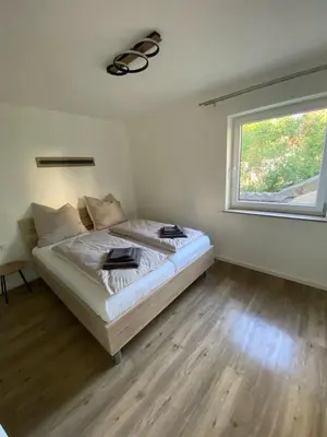 Ein Bett oder Betten in einem Zimmer der Unterkunft Appartement Seegefeld