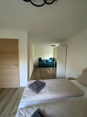 Ein Bett oder Betten in einem Zimmer der Unterkunft Appartement Seegefeld