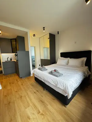 Ein Bett oder Betten in einem Zimmer der Unterkunft Garden Apartments