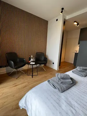 Ein Bett oder Betten in einem Zimmer der Unterkunft Garden Apartments