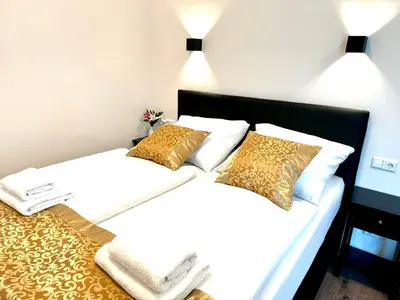 Ein Bett oder Betten in einem Zimmer der Unterkunft Atlas Apartment