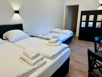Ein Bett oder Betten in einem Zimmer der Unterkunft Atlas Apartment