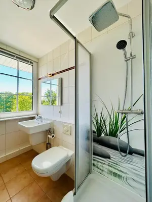 Ein Badezimmer in der Unterkunft Balkon-Studio im Hotel Reindahls