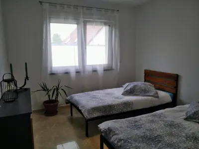 Ein Bett oder Betten in einem Zimmer der Unterkunft Ferienwohnung Beetzseeheide