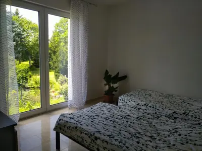 Ein Bett oder Betten in einem Zimmer der Unterkunft Ferienwohnung Beetzseeheide